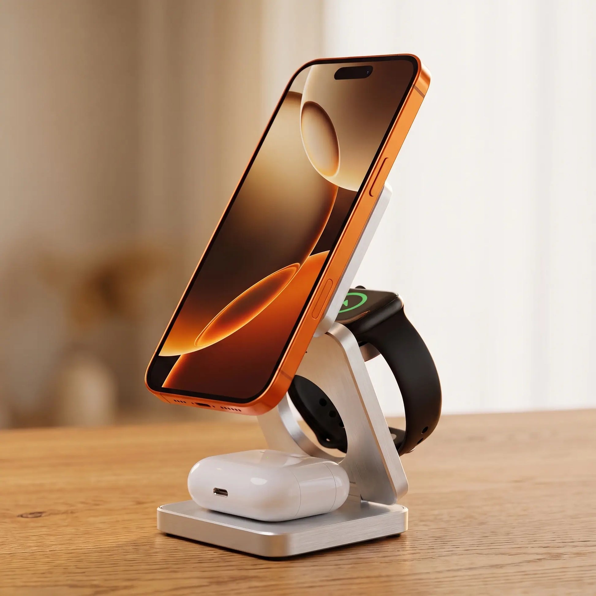 The Fold, Brushed Silver, open with phone, watch and earbuds charging