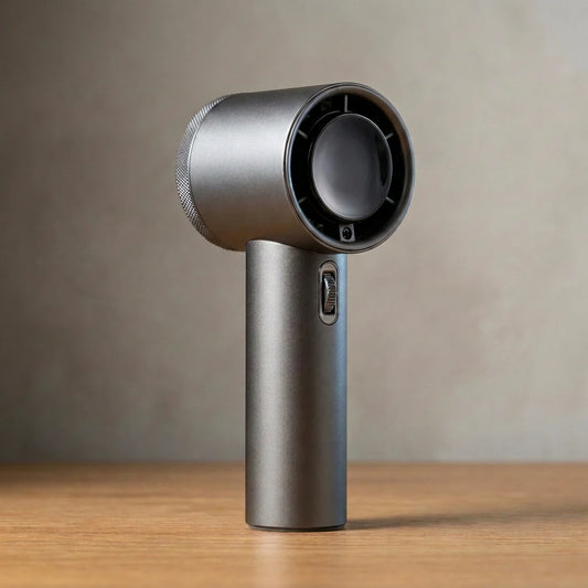 The Gust handheld turbo fan in Graphite