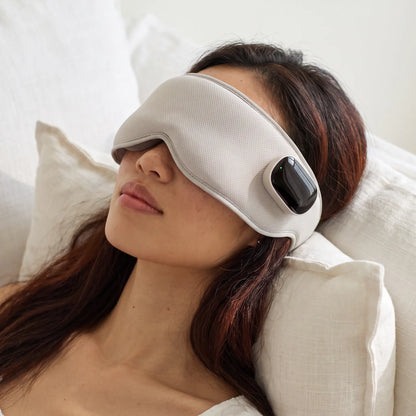 The Unwind heated eye massager in Light Grey