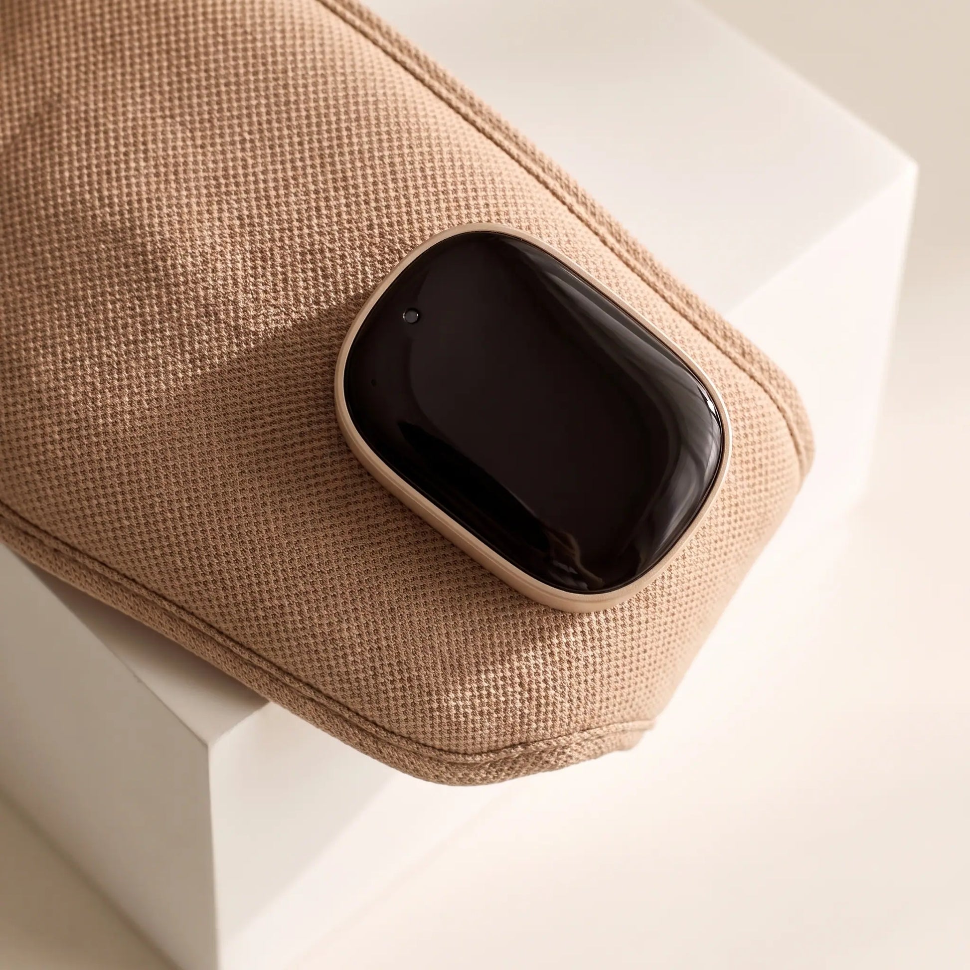 The Unwind — glossy charging module detail
